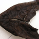 Leather fragment of the infant bootie.